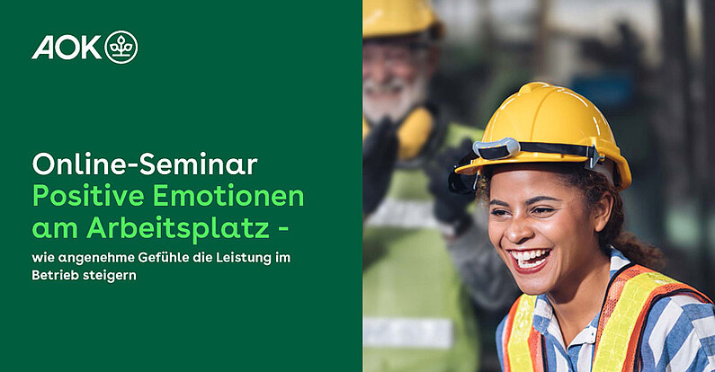 Online-Seminar „Positive Emotionen“: Frau und Mann lachen mit Schutzhelm