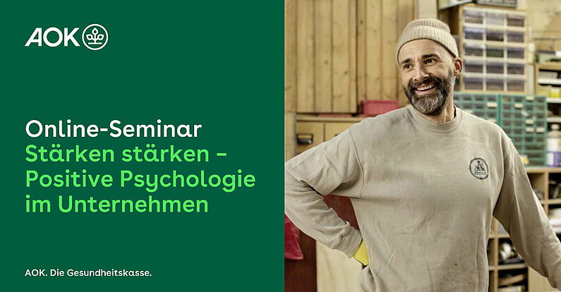 Online-Seminar „Stärken stärken“: Mann im Betrieb schaut fröhlich