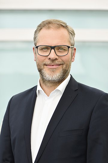 Dr. Kai Behrens Porträt: Dr. Kai Behrens, Pressesprecher des AOK-Bundesverbandes
