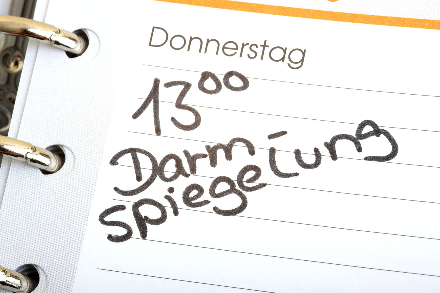 Kalender mit Datum und Eintrag 13:00 Uhr Darmspiegelung